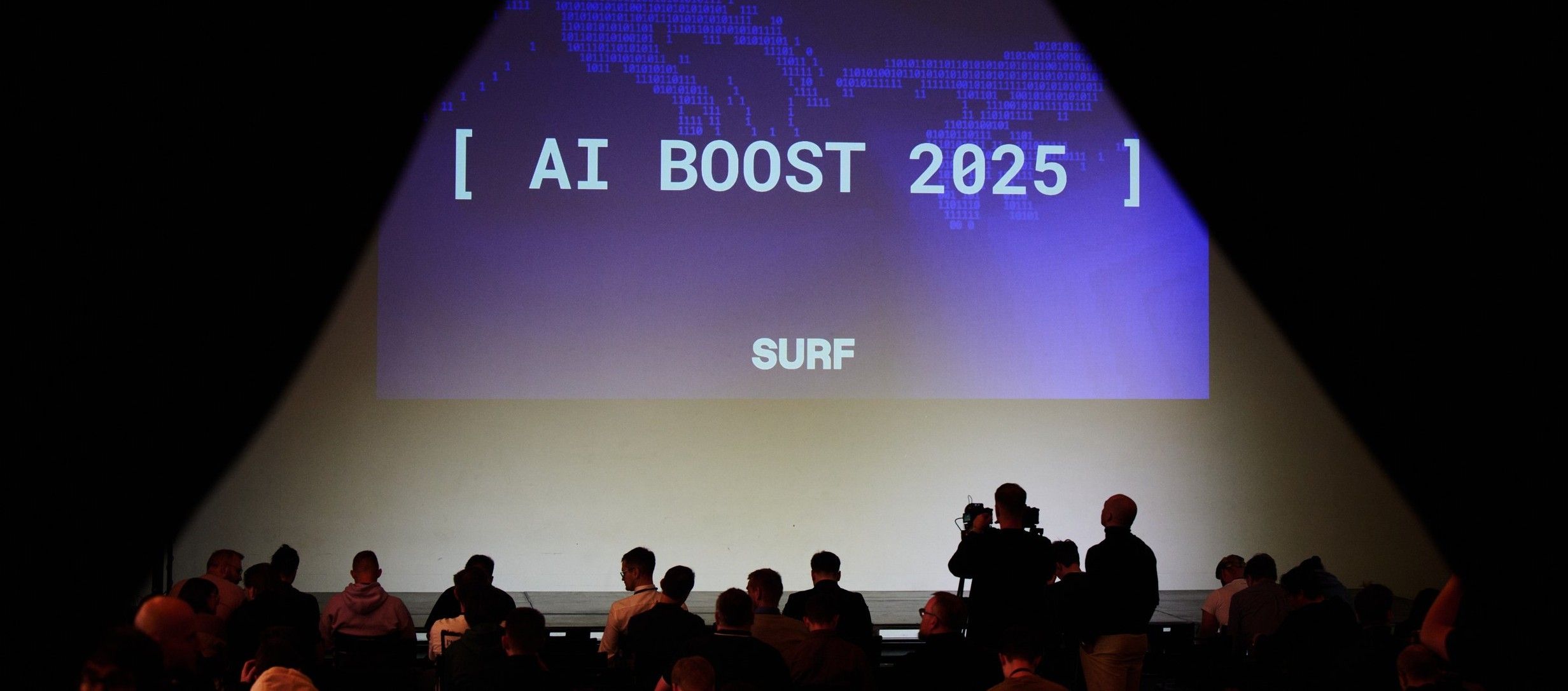 AI BOOST 2025: как мы создали первую в России конференцию про ускорение разработки с ИИ